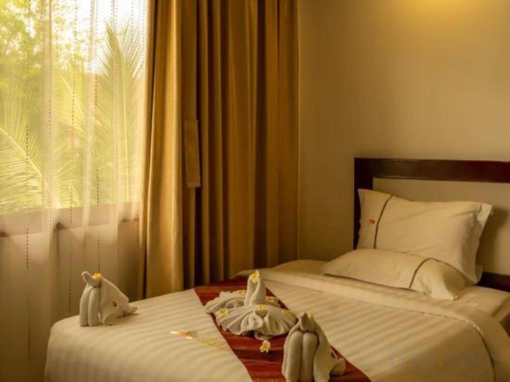 Xishuangbanna Hotel Managed By Xandria Hotel Luang Prabang Exteriör bild